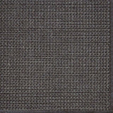 Close-up of a textured woven performance carpet in dark brown.