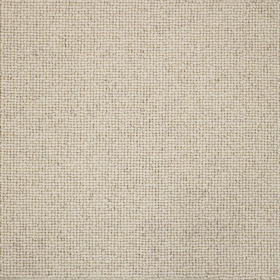 Broadloom carpet swatch in a solid pattern cream color