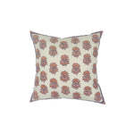 Square throw pillow with a repeating thistle pattern in delicate Indian kantha embroidery on a cream field.