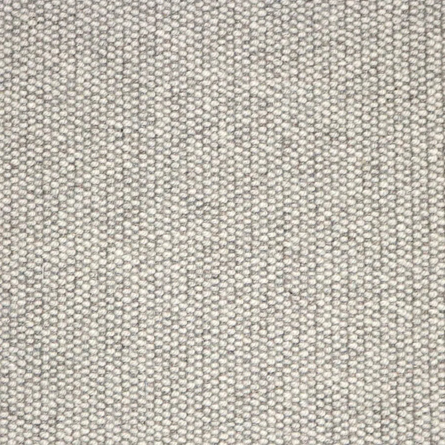 Broadloom carpet swatch in textural light grey color