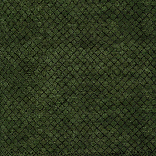 Handknotted rug in a black lattice design on a green field. 