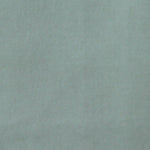 Detail of velvet fabric yardage in aquamarine.