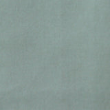 Detail of velvet fabric yardage in aquamarine.