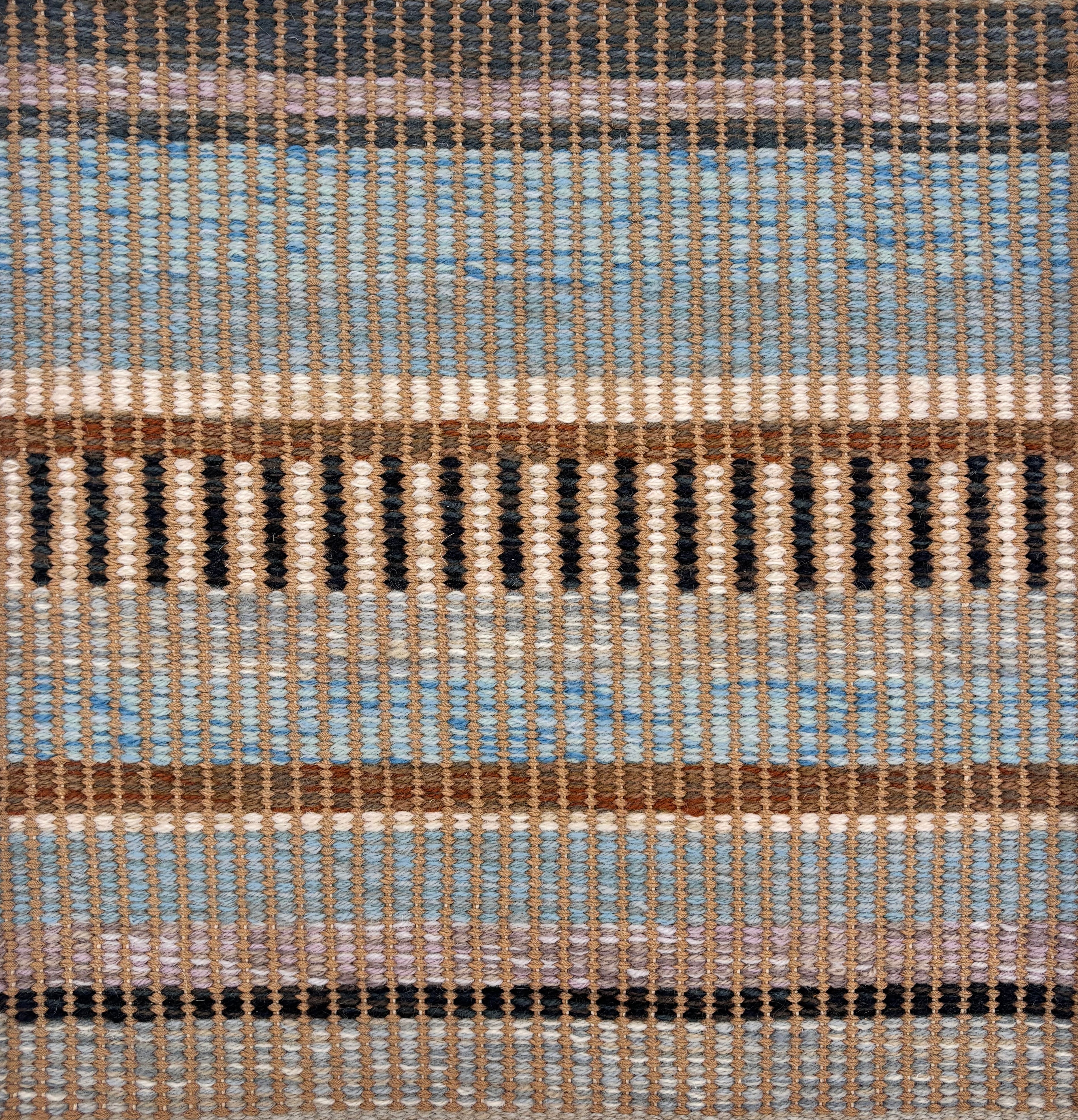 Handwoven rug sample in a mixed width stripe pattern  in light blue, brown, mauve, cream, charcoal and teal. 