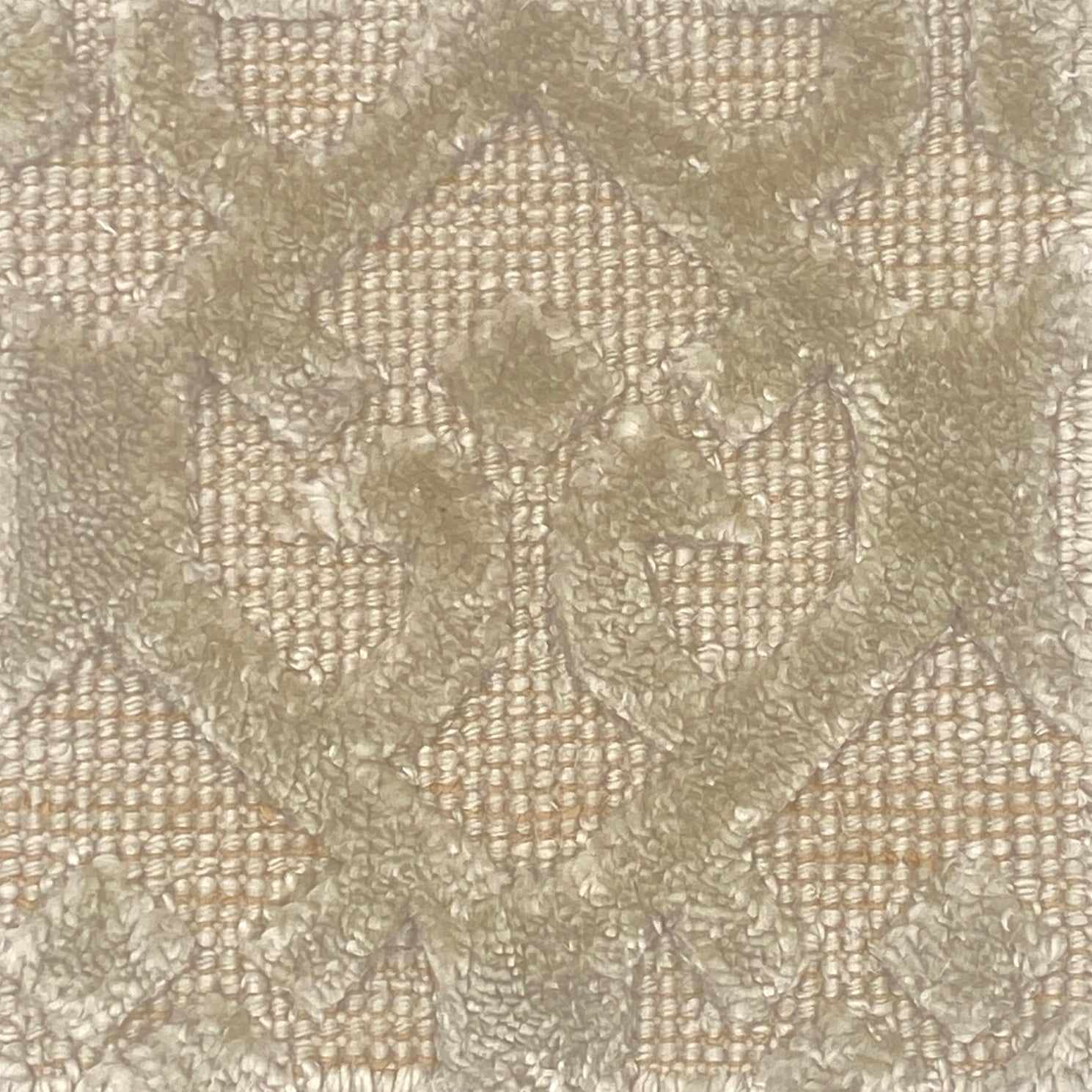 Close-up of textured rug with a subtle pattern