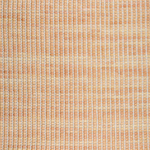 Detail of upholstery leather yardage in a grid texture in mottled orange with white accents.