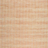 Detail of upholstery leather yardage in a grid texture in mottled orange with white accents.