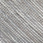 Detail of a woven leather rug in a striped grid texture in gray.