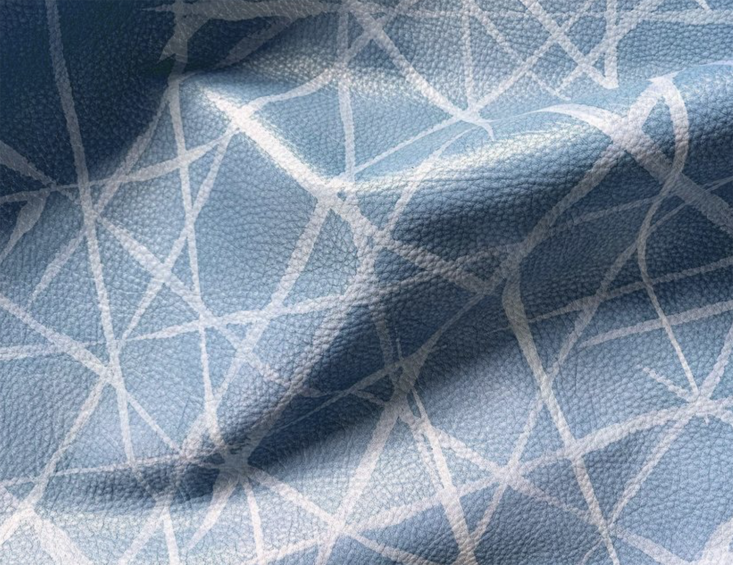 Draped upholstery leather in blue with a painterly grid overlay in white.