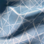 Draped upholstery leather in blue with a painterly grid overlay in white.