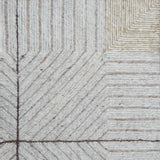 Close-up of a textured rug with geometric pattern