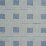Patterned rug with blue and gray design