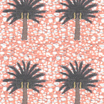 Detail of fabric in a repeating palm tree print on a mottled field in shades of brown, gray, pink and white.