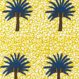 Detail of fabric in a repeating palm tree print on a mottled field in shades of brown, navy, yellow and white.
