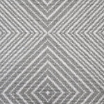 Broadloom carpet sample in a linear diamond design in white and pewter grey.