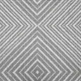 Broadloom carpet sample in a linear diamond design in white and pewter grey.