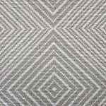 Broadloom carpet sample in a linear diamond design in white and green-grey.