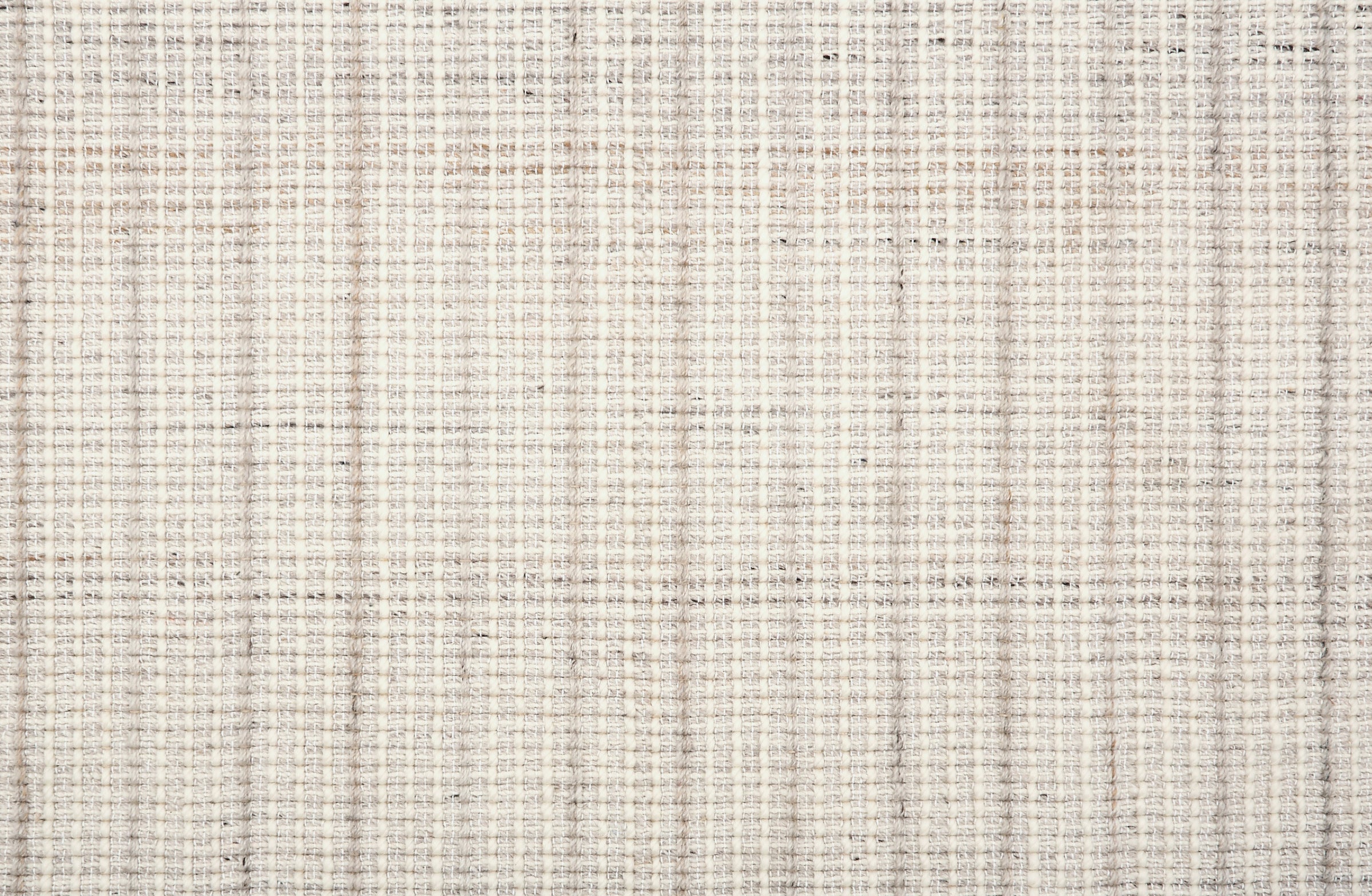 Broadloom carpet in a textural strie stripe in cream with shades of taupe.