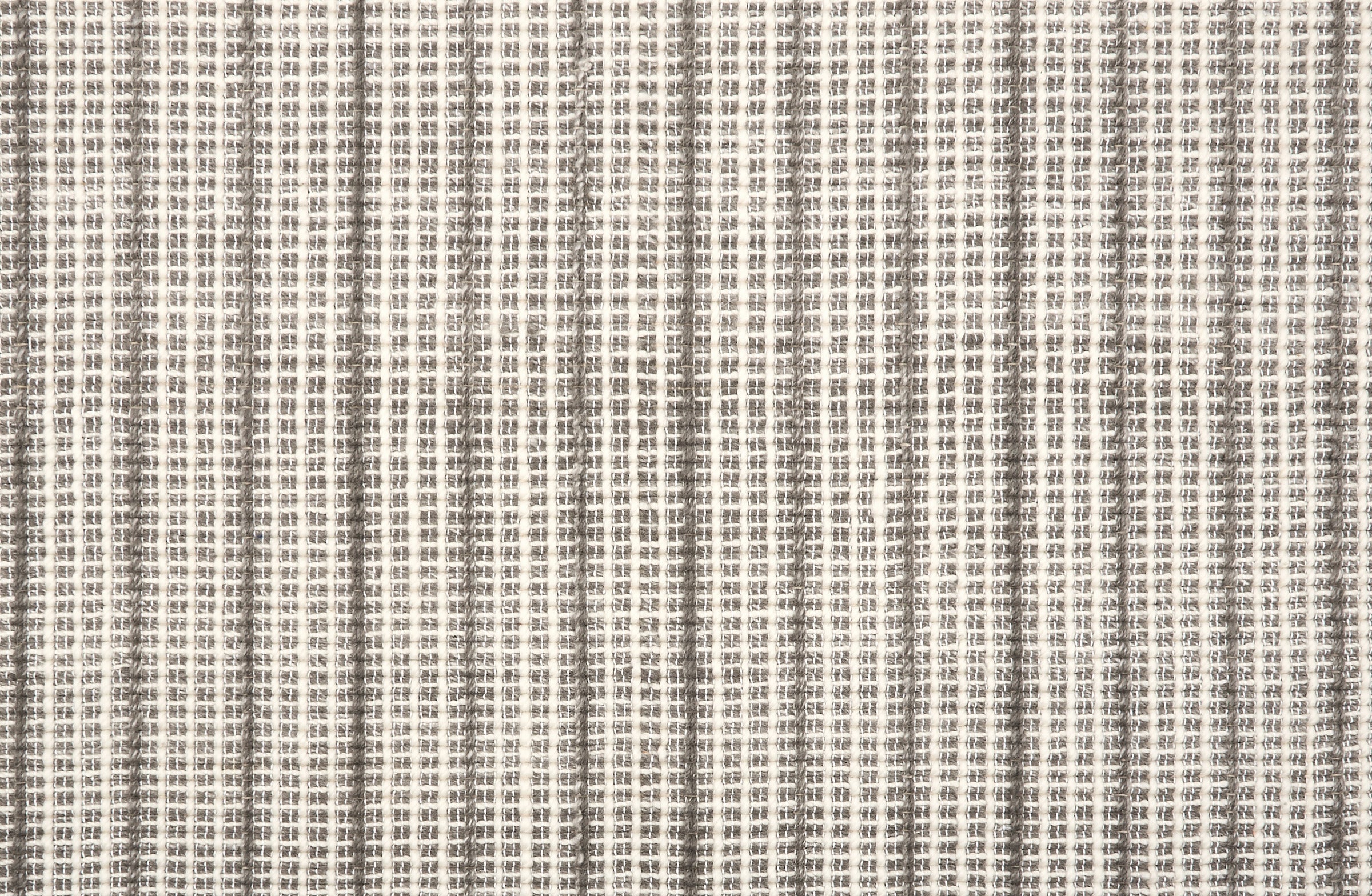 Broadloom carpet in a textural strie stripe in cream with shades of brown.