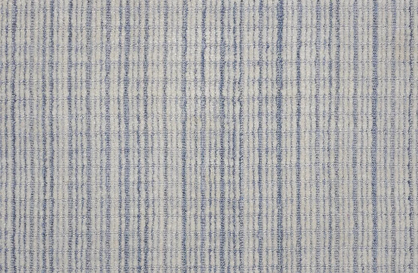 Broadloom carpet swatch in slightly striped light blue color