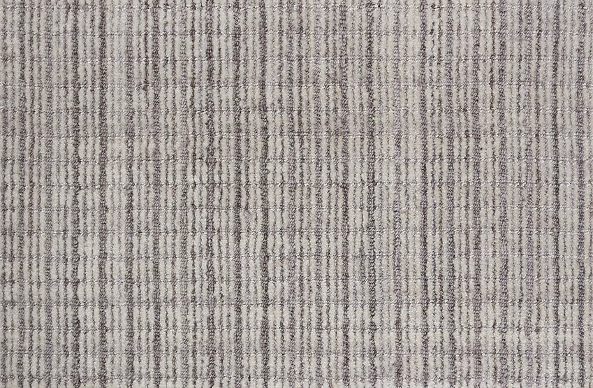 Broadloom carpet swatch in slightly striped light grey color