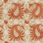 Detail of fabric in a paisley print in shades of tan and red on a white field.