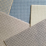 Collection of plaid broadloom swatches in various colors