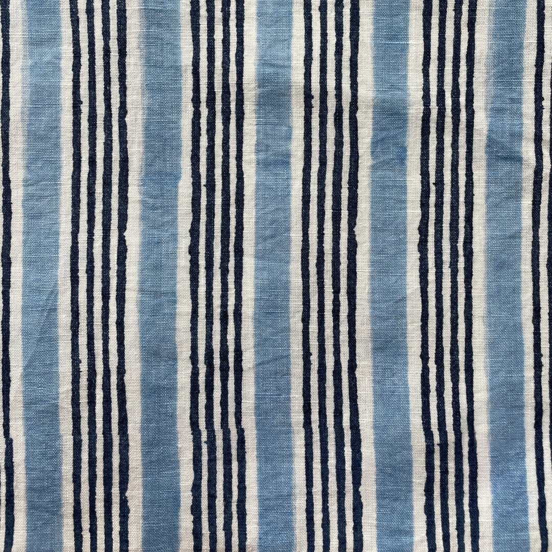 Handprinted stripe in indigo and blue on ivory.