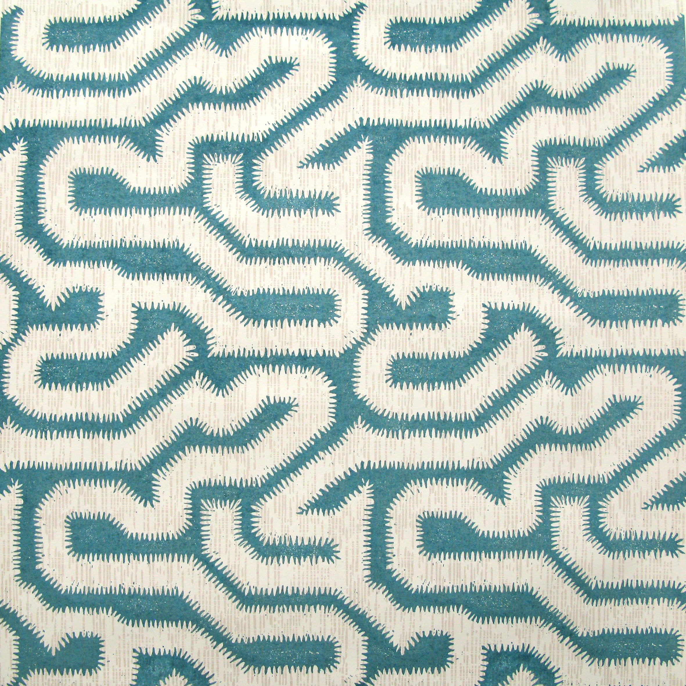 Detail of wallpaper in a playful meandering print in cream on a turquoise field.