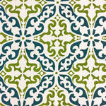 Detail of fabric in a damask print in green and navy on a cream field.