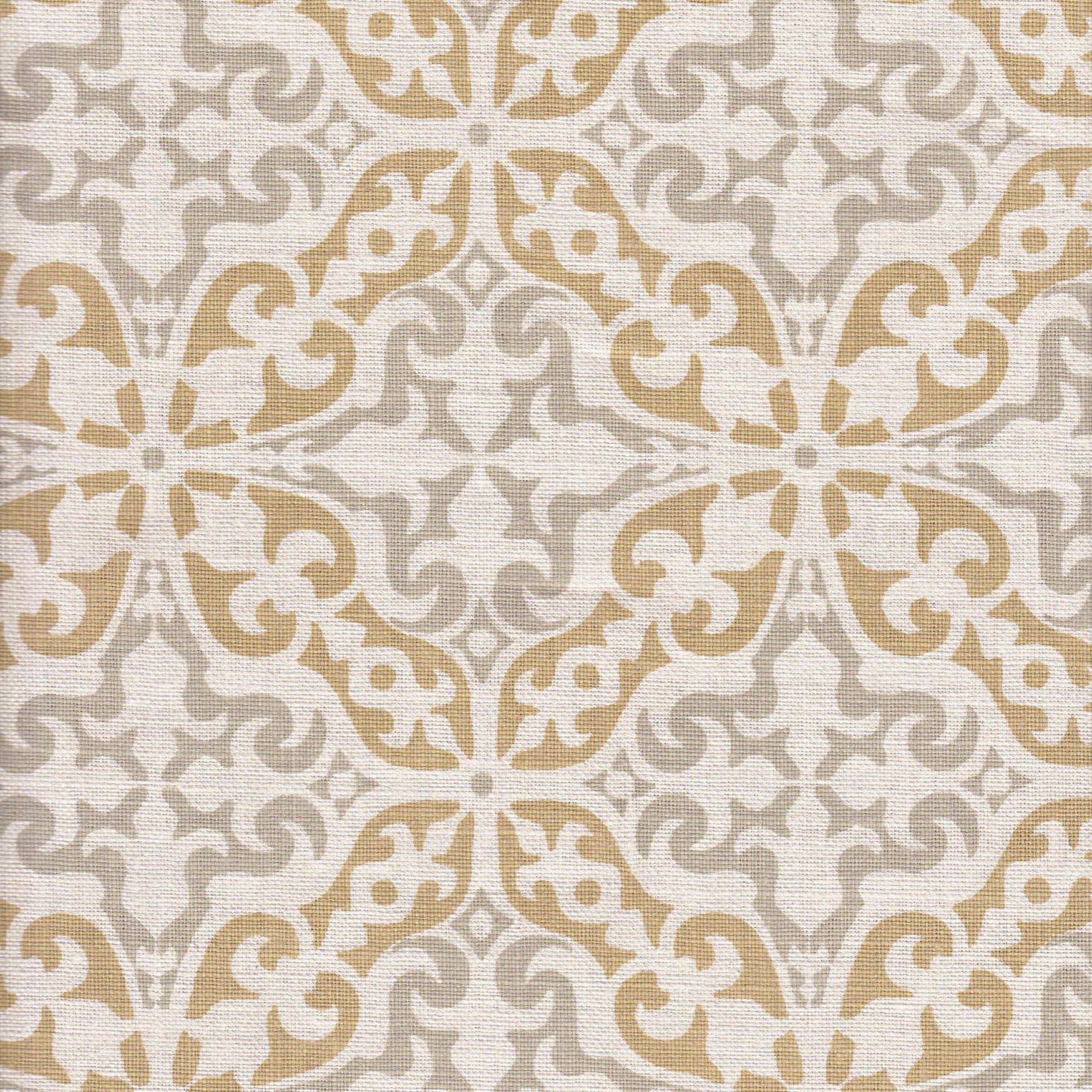 Detail of fabric in a damask print in gray and tan on a cream field.