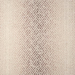 Broadloom with a geometric pattern on an ombré background in cream and taupe.