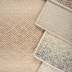 Close-up of textured carpet swatches with geometric pattern