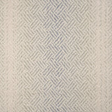 Broadloom with a geometric pattern on an ombré background in cream and grey.