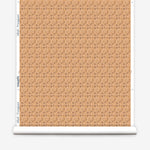 Wallpaper roll with small scale watercolor floral in warm beige.