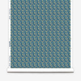 Wallpaper roll with small scale watercolor floral in green on a teal background. 