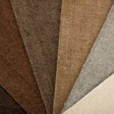 Broadloom carpet in an array of solid neutral colors.