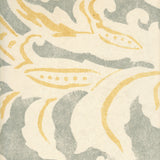 Detail of wallpaper in a floral damask print in light yellow and gray on a cream field.