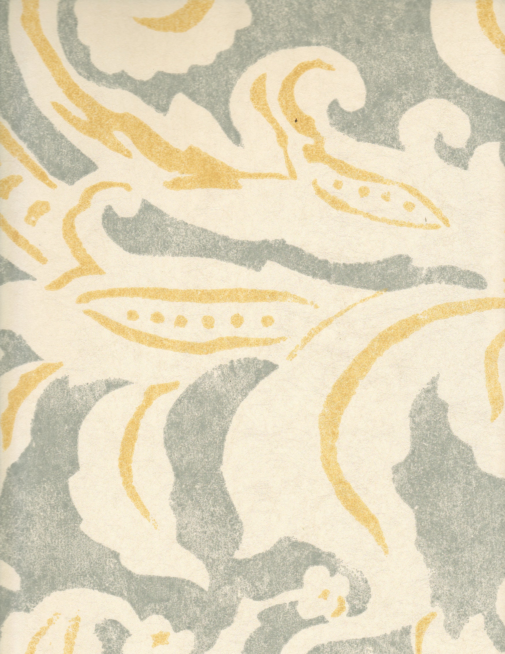 Detail of wallpaper in a floral damask print in light yellow and gray on a cream field.