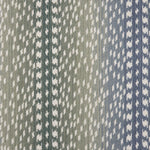 Broadloom carpet with a cream dashed stripe on an ombré field in blue and green. 