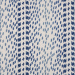 Broadloom carpet with a dashed stripe in shades of blue on a cream field. 