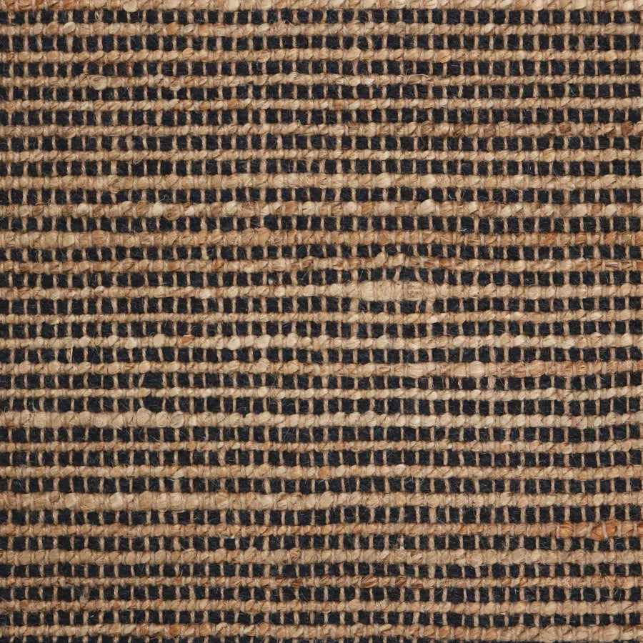 Broadloom carpet swatch in textural tan/black color