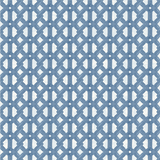 Detail of wallpaper in an intricate lattice print in light blue on a white field.