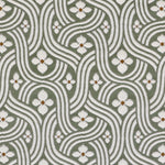 Detail of fabric in a floral damask print in white and rust on a sage field.