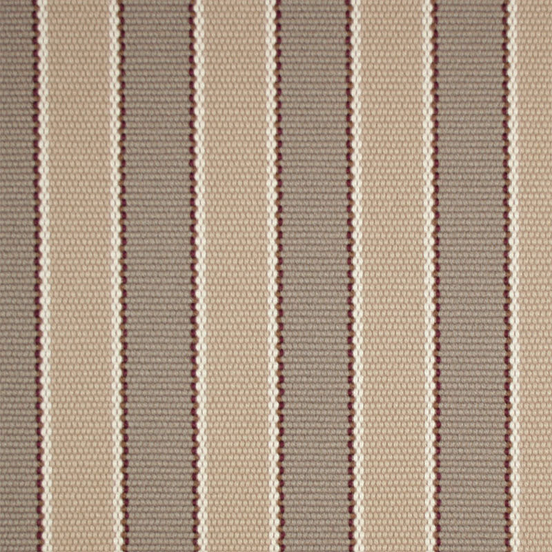 Striped flatweave runner detail in shades of tan and taupe.