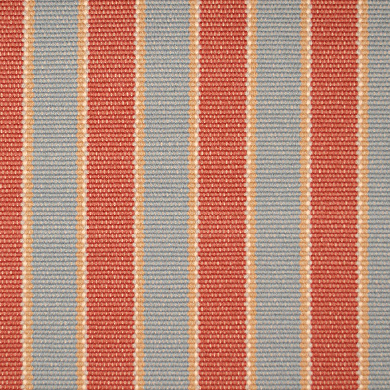 Striped flatweave runner detail in orange and blue.