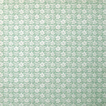 Detail of wallpaper in a floral grid print in white on a blue-green field.