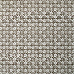 Detail of wallpaper in a floral grid print in white on a dark brown field.