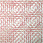 Detail of wallpaper in a floral grid print in white on a dusty rose field.