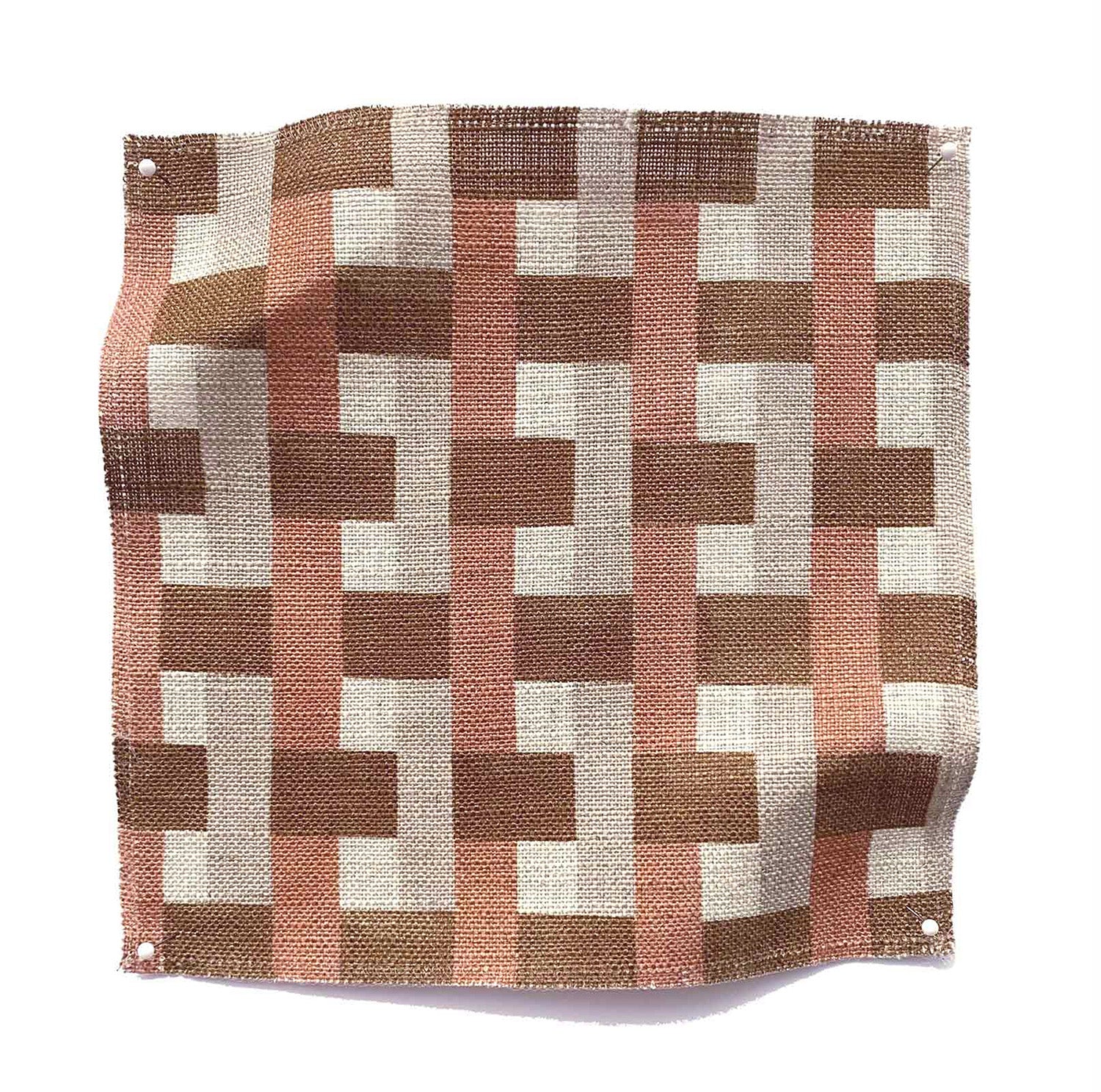 Square fabric swatch in an interlocking checked pattern in shades of pink, tan and brown.